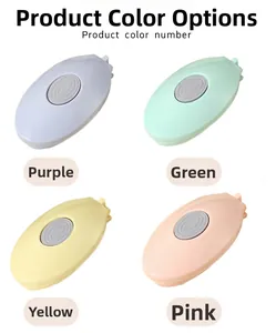 Foldable macaron hairbrush with mirror in purple, green, yellow, and pink colors
