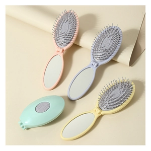 Portable folding hairbrush with mirror in macaron colors for travel and scalp massage