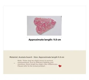 Detail of pink marble heart hair comb made of premium acetate with anti-static teeth