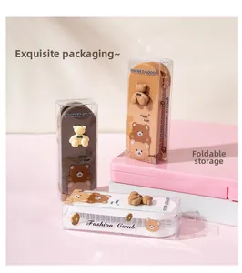 Detail of portable folding hair combs with cute cartoon bears and premium packaging