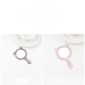 Specchi a mano a forma di orecchie di gatto in acetato marmorizzato rosa