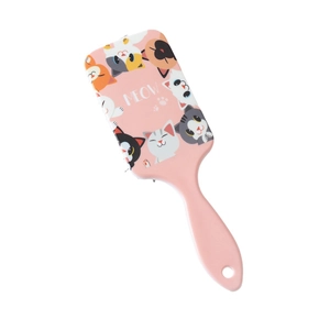 Cute pink air cushion hairbrush with cartoon cat patterns and MEOW text on a white background