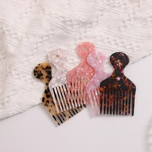 5-piece acetate hair pick set with wide teeth and colorful marble patterns for curly hair