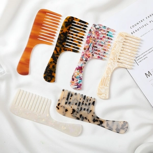 Acetate wide-tooth hair comb set in colorful marble and tortoiseshell patterns