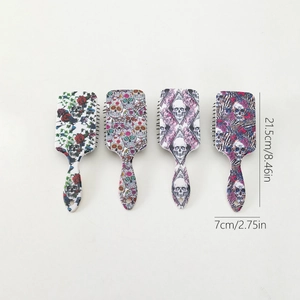 Detailed dimensions of 21.5cm length for the skull patterned hair brush set
