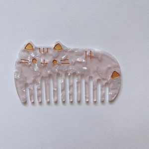 Pink acetate wide-tooth hair comb with cute cat design and golden marble texture
