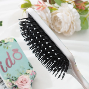 Floral print air cushion hairbrush with massage bristles and i do rose pattern design