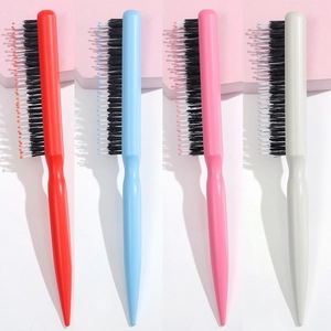 Detail of professional three-row teasing hairbrush set with pointed handles in four colors
