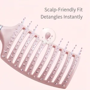 Pink curved vent brush with soft round teeth for scalp massage and hair styling