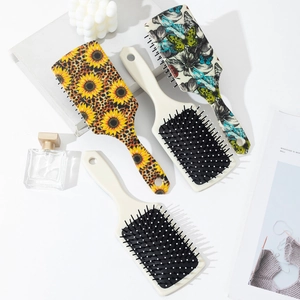 Set of four sunflower ocean series paddle hair brushes with massage air cushion for women
