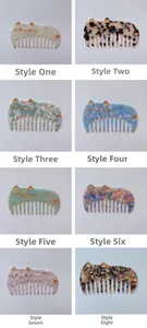 Close-up of cat-shaped acetate wide-tooth hair combs in eight different marble patterns