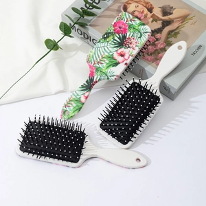 Floral print air cushion hairbrush set with tropical leaf patterns and soft massager bristles