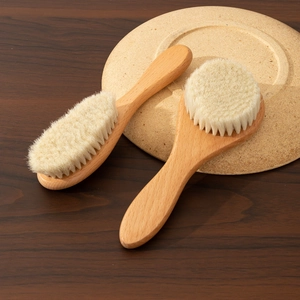 Natural beechwood baby hairbrush set with soft wool bristles for gentle infant grooming