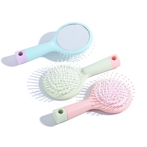 Three-piece set of portable hair cushion brushes with integrated mirrors in macaron colors