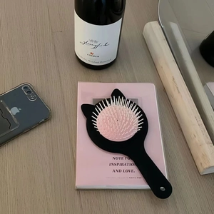 Cute cat-shaped hair brush with pink air cushion and massage bristles for kids