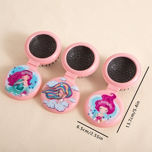 Pink cartoon mermaid folding travel hair brush with mirror in compact round shape