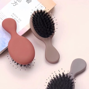 Mini portable air cushion hairbrush with boar bristles and non-slip handle in Morandi colors