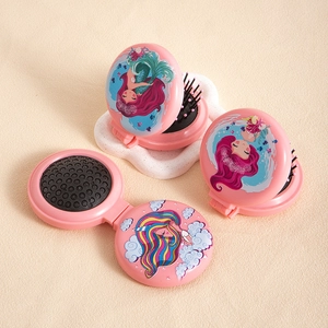 Portable folding mermaid hairbrush with mirror and pink cushioned bristles for travel