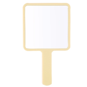 Cat-themed handheld makeup mirror in peach pink with ergonomic handle for portable grooming