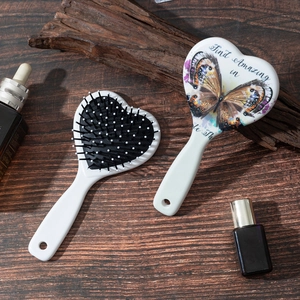 Vintage heart shaped folding hairbrush with butterfly design and massage pins