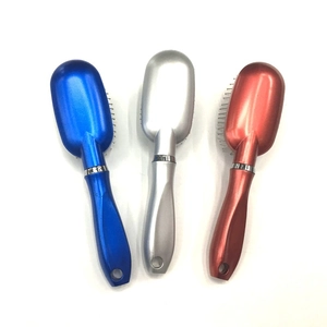 Portable air cushion hairbrush set in metallic blue, silver, and red with steel pins