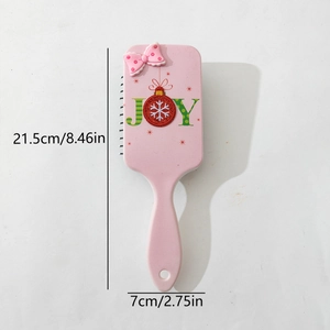 Pink bow cushion hairbrush with JOY holiday design and anti-static air cushion bristles