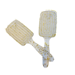 Set of two stylish hollow hairbrushes with gold foil flakes and scalp massage tips