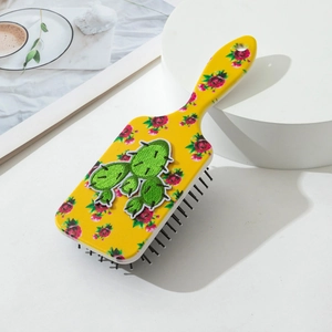 Brosse à cheveux jaune à coussin d'air avec fleurs et patch cactus pour massage doux