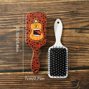 Halloween pumpkin air cushion hairbrush set with festive patterns and boo lettering