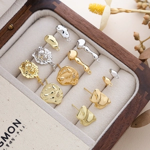 Baroque style gold and silver plated metal earrings and DIY jewelry accessories in a box