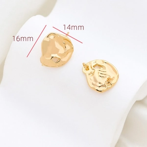 Close-up of 16x14mm irregular gold-plated earrings with lava texture for DIY jewelry