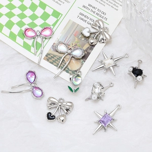 DIY jewelry charms in bow, star and heart shapes with zircon inlays for necklaces