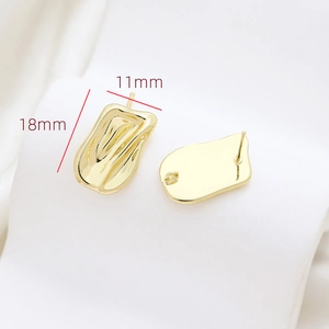 Macro view of 18x11mm gold-plated baroque textured geometric earring studs for DIY