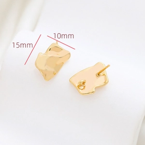 Macro detail of irregular wavy gold earring studs with DIY loop and 15mm size dimensions