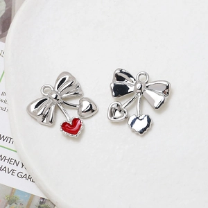 Silver bow pendant with red enamel heart drop for DIY jewelry making and accessories
