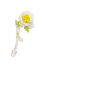 Handmade beaded flower pendant with white petals, yellow center and crystal drop charm