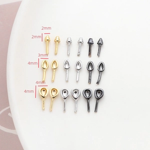 Detail of 2mm 3mm 4mm DIY jewelry findings in gold silver and gun black metal finishes