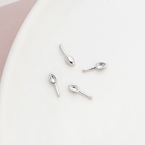 Macro view of polished silver-plated ghost horn DIY jewelry accessories for baroque design