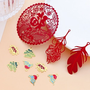 Traditional Chinese DIY jewelry pendants with red Fu character, lotus, and cloud motifs