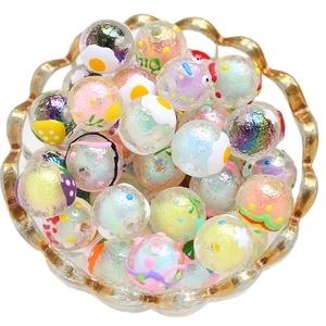 Iridescent handmade glass beads with hand-painted patterns for DIY jewelry making