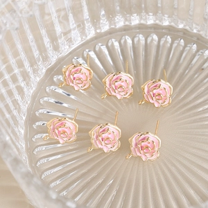 Macro shot of 6 pink enamel camellia flower earring charms with gold plating and S925 studs