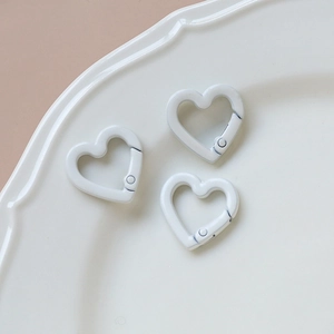 Three white heart-shaped metal spring clasps for DIY jewelry and keychain accessories