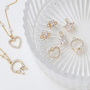 Gold-plated heart and star pendants with pavé zircons for DIY jewelry making