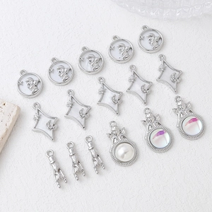 DIY silver-tone charms with angel relief and star pendants for handmade jewelry making