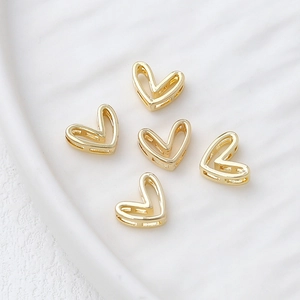 Set of five 14k gold plated heart-shaped hollow charms for DIY jewelry making