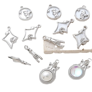 Selection of alloy angel and star pendants for DIY jewelry making in silver finish