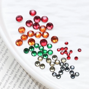 Detailed view of colorful multi-size flatback rhinestones for DIY crafts and nail art