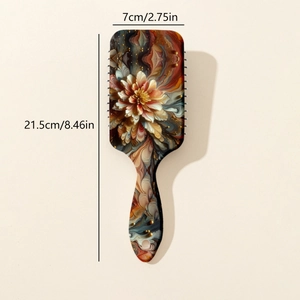 Detailed view of the vintage floral hairbrush with dimensions 21.5cm by 7cm