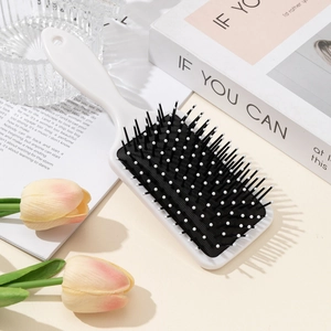 Floral retro cushion hairbrush with white massage pins for detangling and scalp massage