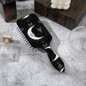 Brosse à cheveux pneumatique gothique avec motif lune et crâne style vintage